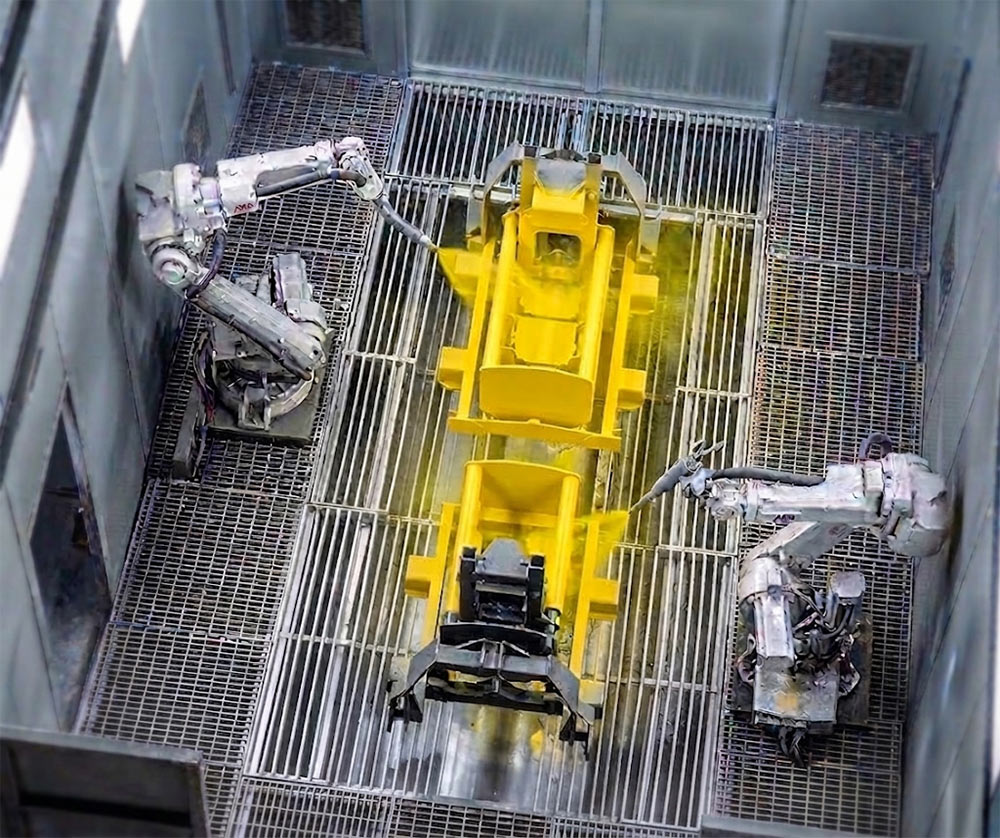 Isola di verniciatura con due robot coordinati